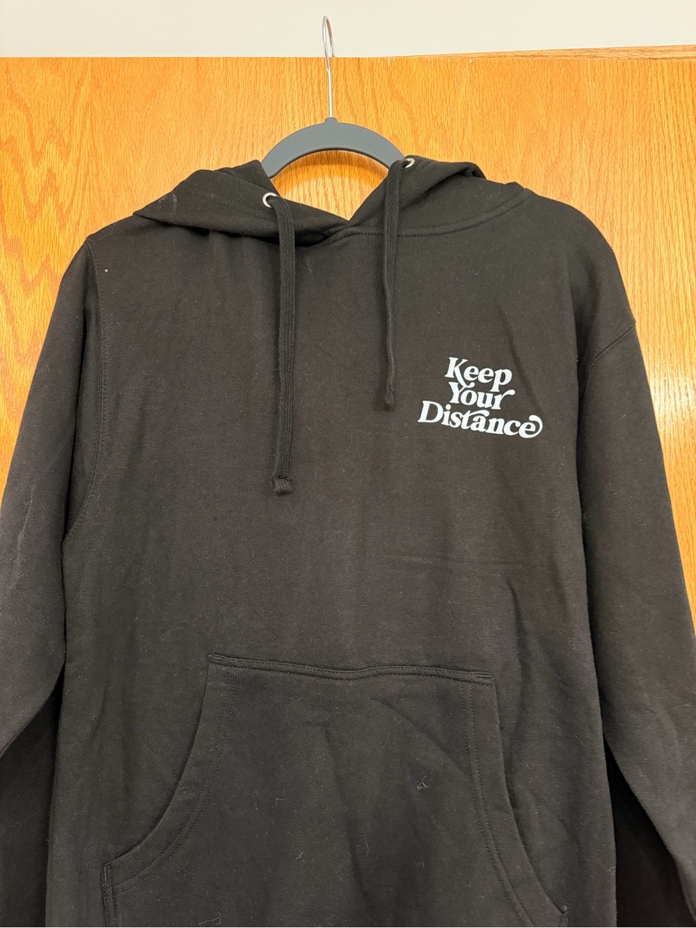 Young & Reckless Black Hoodie with White "Keep Your Distance" Print